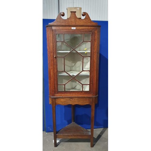 716 - An antique oak and glazed Corner Cabinet on stand 5ft 11in H x 2ft 3in W (R11)