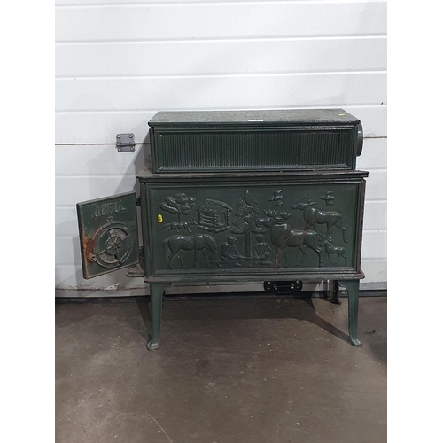 719 - A green painted cast iron Stove A/F 2ft 7in H x 2ft 5in W (R10)