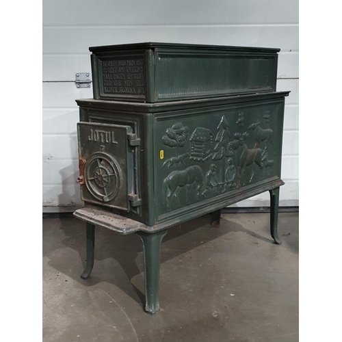 719 - A green painted cast iron Stove A/F 2ft 7in H x 2ft 5in W (R10)