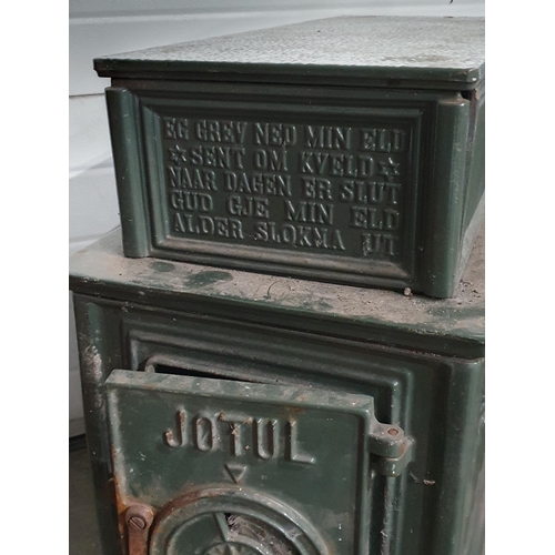 719 - A green painted cast iron Stove A/F 2ft 7in H x 2ft 5in W (R10)