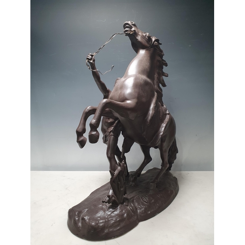 729 - A large spelter Marley Horse and Figure, the base stamped Cousto, 23in H (R9)