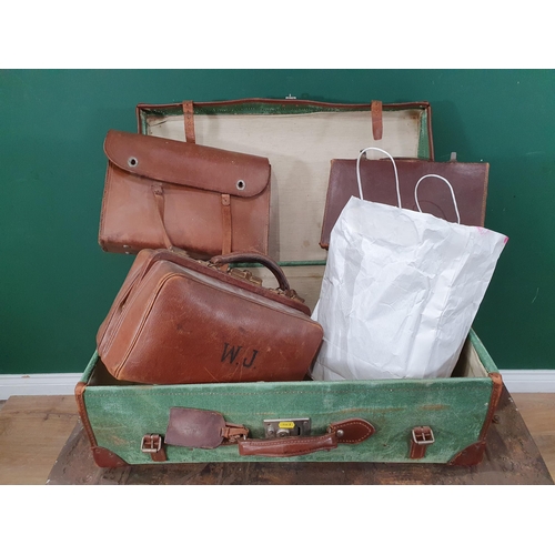 744 - A leather bound, green canvas Trunk containing a leather Doctor's Bag, a leather Music Case, a small... 