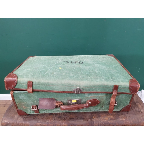 744 - A leather bound, green canvas Trunk containing a leather Doctor's Bag, a leather Music Case, a small... 