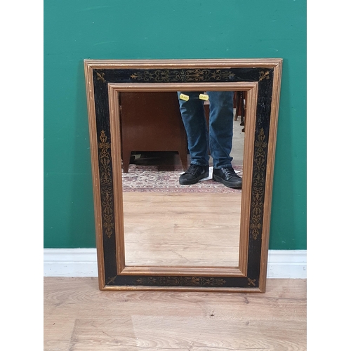 747 - A gilt framed Wall Mirror with gilt scrolled and fleur de lis border, 2ft 5