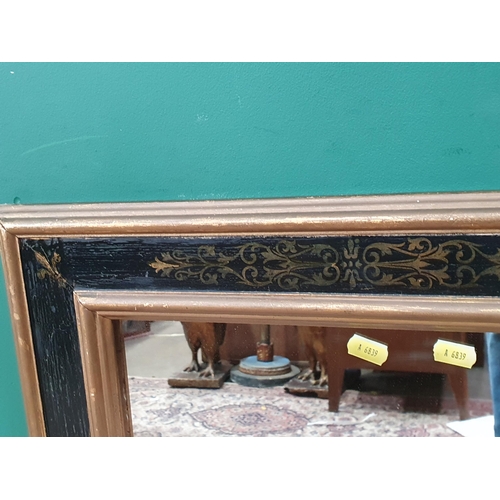 747 - A gilt framed Wall Mirror with gilt scrolled and fleur de lis border, 2ft 5