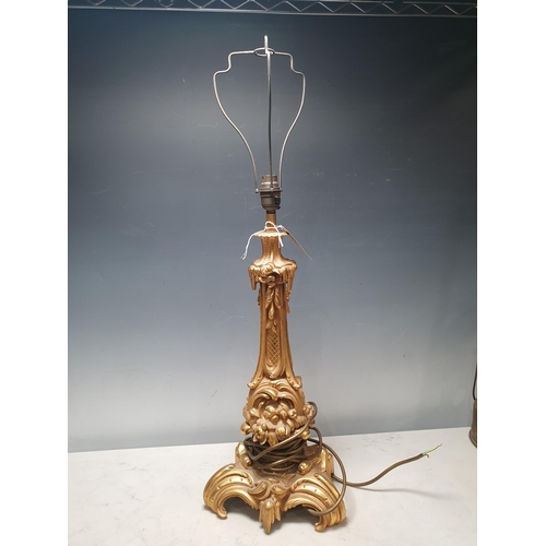 82 - An Ormolu Table Lamp with leafage and floral design to the tapering column on scrolled supports, 21i... 