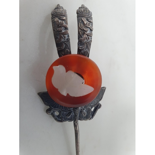 95 - A Chinese silver Hair Pin with butterfly and floral decoration, with applied disc and carved jade ty... 