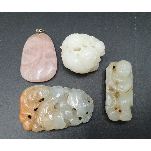 98 - A carved rose pink Pendant with gilt floral mount, and three jade Carvings of fish and lily, two kyl... 