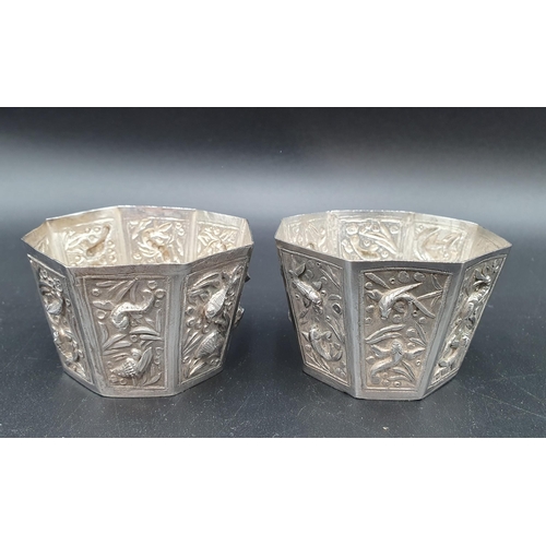 99 - Two Chinese silver octagonal Bowls finely decorated fish, shells, crayfish, etc, 2 1/2in diam, numer... 