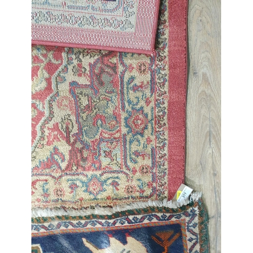 277 - A Persian Rug with bird designs to the corners, 4ft 11in x 3ft and a Ziegler Mat