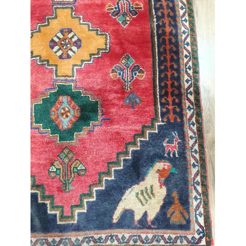 277 - A Persian Rug with bird designs to the corners, 4ft 11in x 3ft and a Ziegler Mat