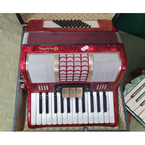 287 - A Mastertone Piano Accordian and Galutta Piano Accordian in case (R2)