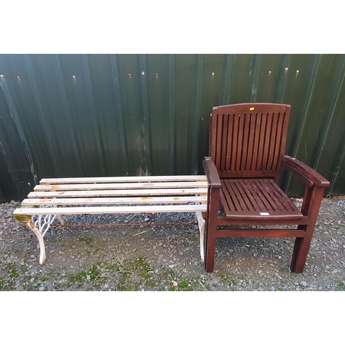 76 - A pair of stained Garden Elbow Chairs and a wood and cast slatted Garden Bench, A/F.