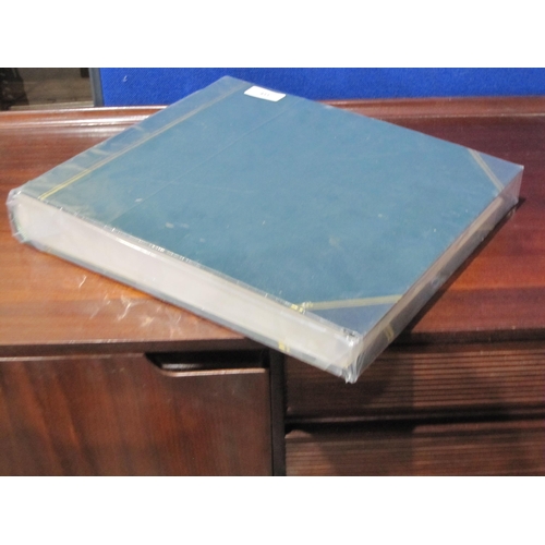 411 - A green Half Leather bound photograph Album , retailed by A. Lydden, Sherborne, Dorset, 34 pages, un... 