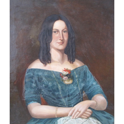 424 - ENGLISH SCHOOL CIRCA 1850. Portrait of a Lady, seated half-length, wearing a blue dress, oil on canv... 