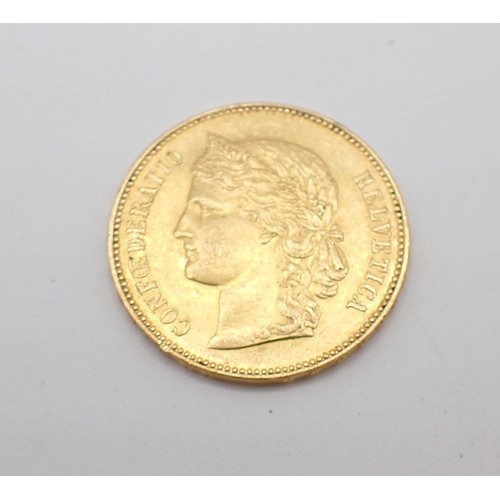 255 - A gold 20 Swiss Franc Coin 1896