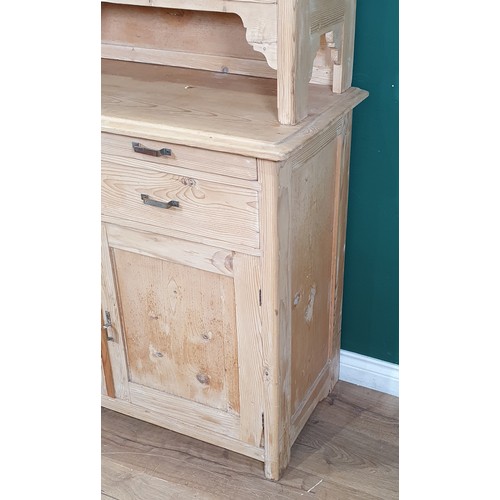 440 - A Pine dresser with Glazed top above two cupboard doors and four drawers H 6ft 3