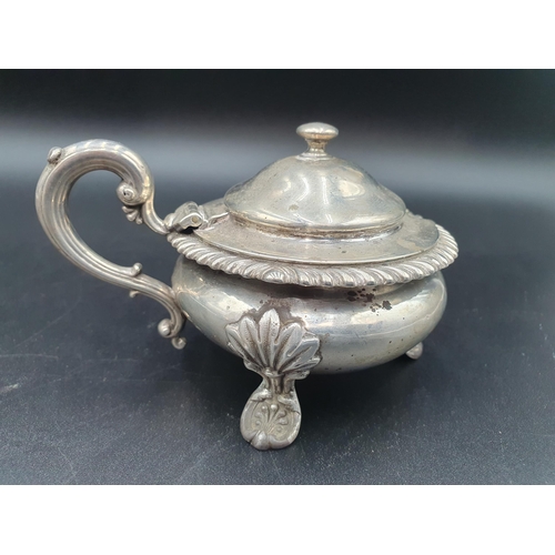 1 - A George III silver large circular Mustard Pot, semi-fluted on anthemion and paw feet, London 1818, ... 