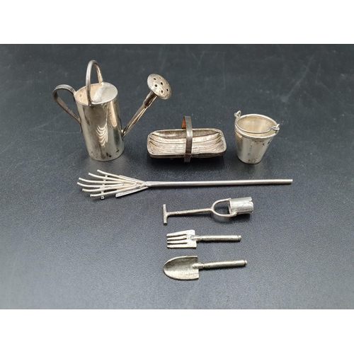 10 - A modern silver miniature Watering Can, Trug, Bucket, Rake, Dibber, Trowel and Fork