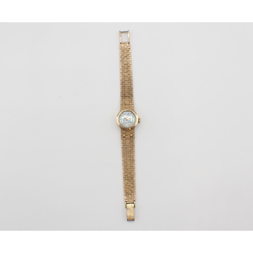 102 - A lady's Cocktail Watch the circular dial painted flowers on blue ground in 9ct gold case, case widt... 