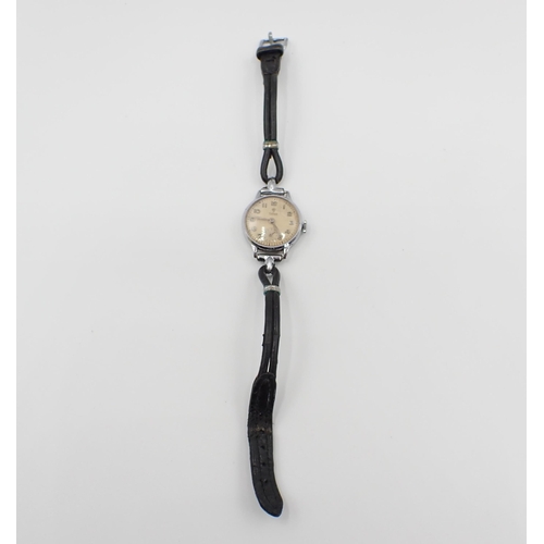 103 - A lady's vintage manual wind Tudor Wristwatch the champagne dial with arabic numerals and subsidiary... 