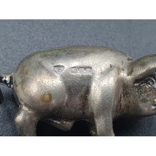 11 - A modern silver miniature Pig, and a Candle Snuffer with owl surmount, both London 1994