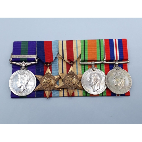 1143 - Five; General Service Medal 'Palestine' Bar, 1939-45 Star, Africa Star and War Medals to 2982260 Pte... 