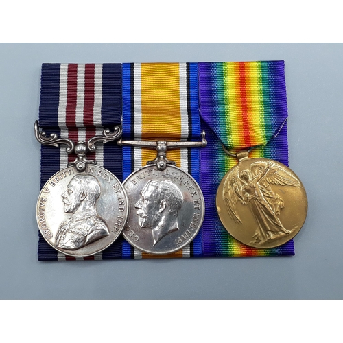 1144 - Three; Military Medal (GV), British War and Victory Medals to S15857 Pte. J.P. Gibson, 14th Battalio... 