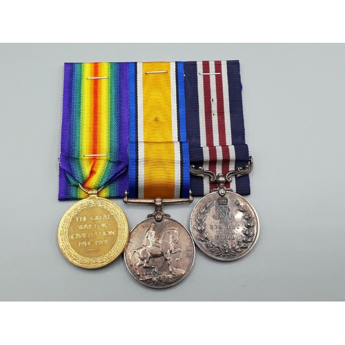 1144 - Three; Military Medal (GV), British War and Victory Medals to S15857 Pte. J.P. Gibson, 14th Battalio... 