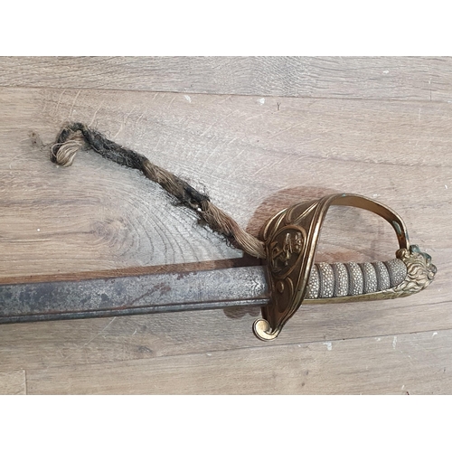 1156 - A Victorian British Naval Officer's Sword with etched pipe back blade in rusted and pitted condition