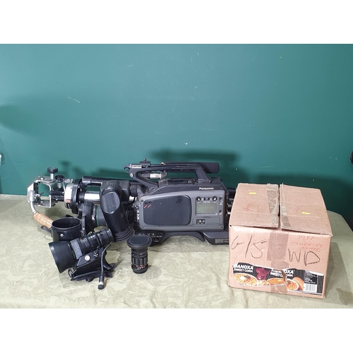 1375 - A Panasonic VHS Camera model No. AG-DP800HEG, additional lenses, and a tripod, etc