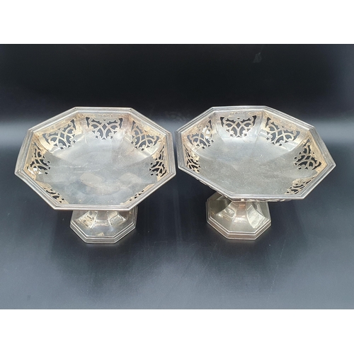 14 - A pair of George V silver octagonal Tazzas with pierced friezes on pedestal bases, Birmingham 1925, ... 