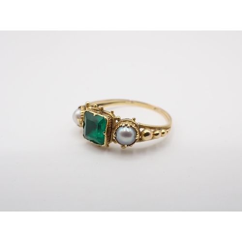 157 - A Georgian Emerald and Pearl Ring close-set step-cut emerald between two pearls in beaded setting, u... 