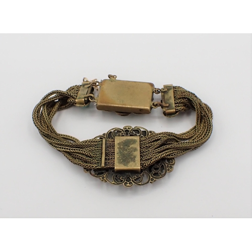 176 - A 1920's Egyptian Revival Bracelet believed to be by Max Neiger, Gablonz. the front with oval plaque... 