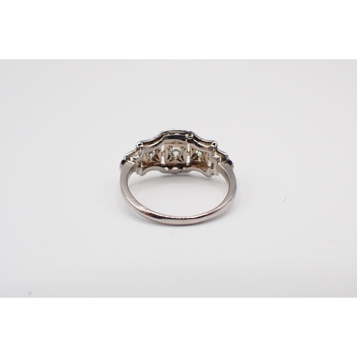 188 - An Art Deco style Diamond Ring pavé-set three graduated principle old and brilliant-cut stones withi... 