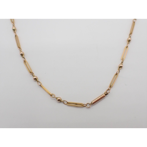 207 - A fancy link Chain marked 9ct, 47cms long, approx 5.90gms