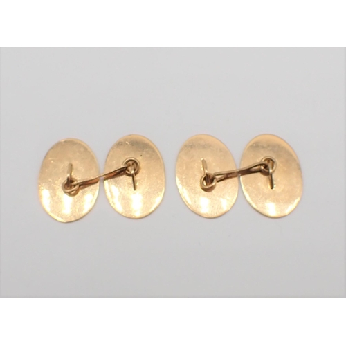 209 - A pair of 18ct gold Cufflinks with bright-cut engraving, approx 8.40gms