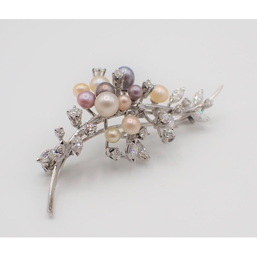 217 - A Cultured Pearl and Diamond Spray Brooch set cultured pearls in various colours amongst marquise an... 