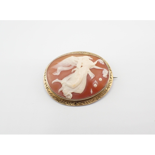 232 - A carved shell Cameo Brooch depicting the goddess Flora in engraved frame, approx 13.60gms, 50mm x 4... 