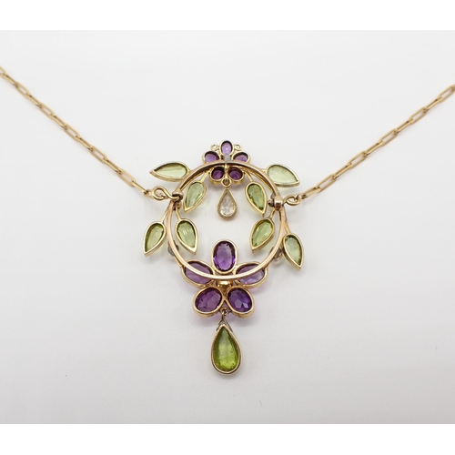 235 - A Diamond, Peridot, Amethyst and Seed Pearl Necklace formed as flowers and leaves on oval frame mill... 