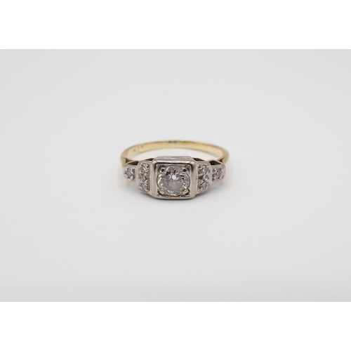 248 - An Art Deco Diamond Ring pavé-set brilliant-cut stones between trios of eight-cut stones, stamped 18... 