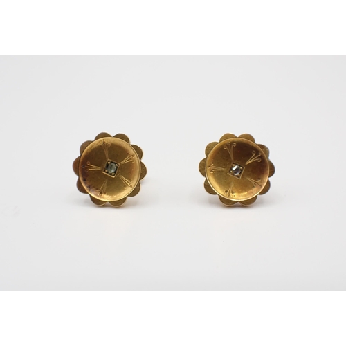 249 - A pair of Diamond Earrings each of rosette form pavé-set rose-cut stone to centre, stamped 15ct, app... 