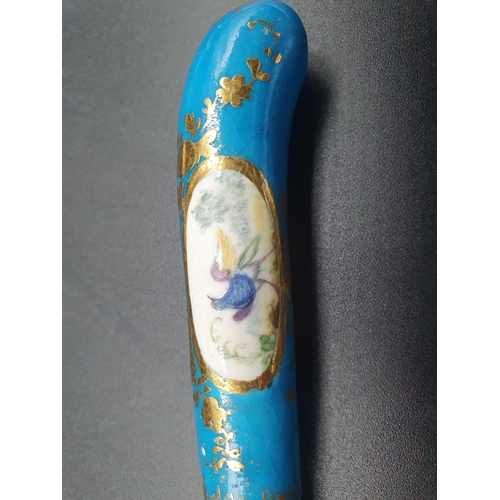 25 - Ten porcelain pistol grip handled Knives painted exotic birds in oval reserves, turquoise and gilt s... 