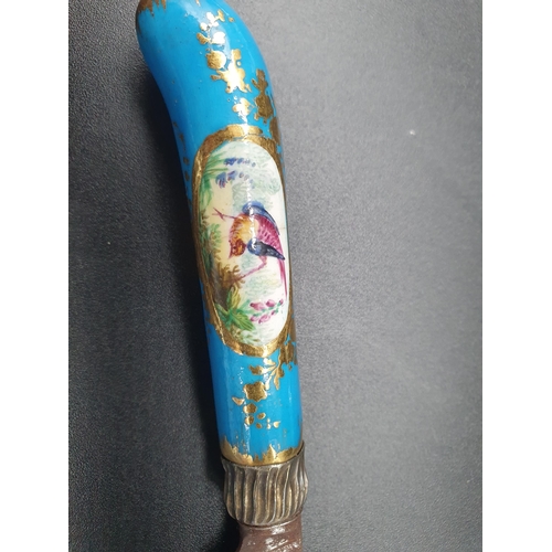 25 - Ten porcelain pistol grip handled Knives painted exotic birds in oval reserves, turquoise and gilt s... 