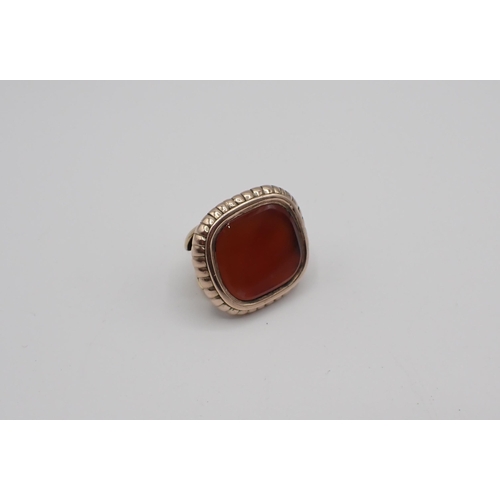 253 - A yellow metal Fob set carnelian, approx 14.40gms