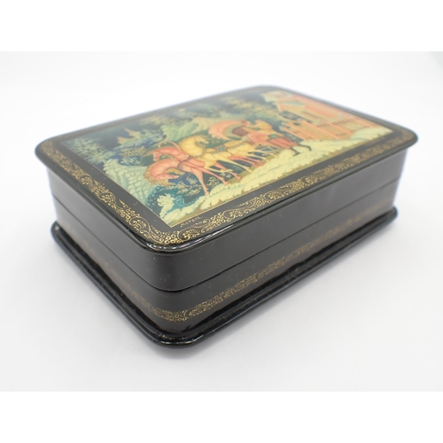 273 - A Russian lacquered Box the hinged lid depicting Winter evening, school; Mstiora, artist; Shmelkova,... 