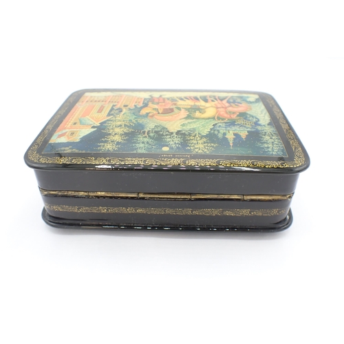 273 - A Russian lacquered Box the hinged lid depicting Winter evening, school; Mstiora, artist; Shmelkova,... 