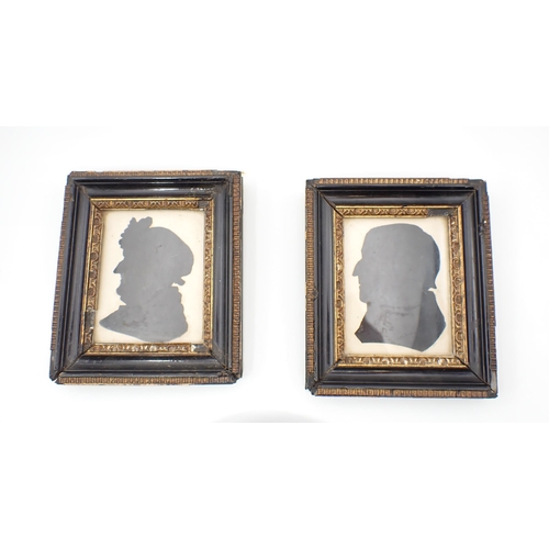 277 - ENGLISH SCHOOL CIRCA 1810. Two profile Silhouettes of a Gentleman and a Lady, both head and shoulder... 