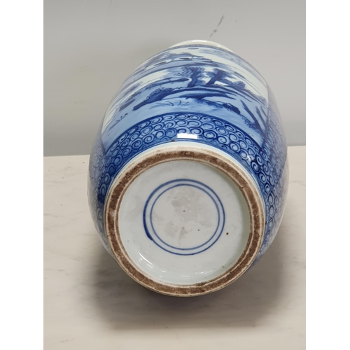 341 - A 19th Century Chinese blue and white Vase of baluster form, decorated panels of landscapes, 12 1/2i... 