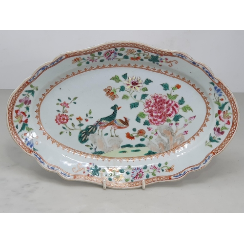 346 - A 19th Century Chinese famille rose lozenge shaped Dish with painted scene of peacocks amongst flowe... 